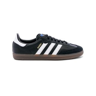 black Adidas samba sneakers with white stripes