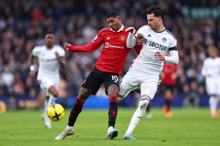 Marcus Rashford of Manchester United and Robin Koch of Leeds United during the Premier League match between Leeds United and Manchester United at Elland Road on February 12, 2023 in Leeds, United