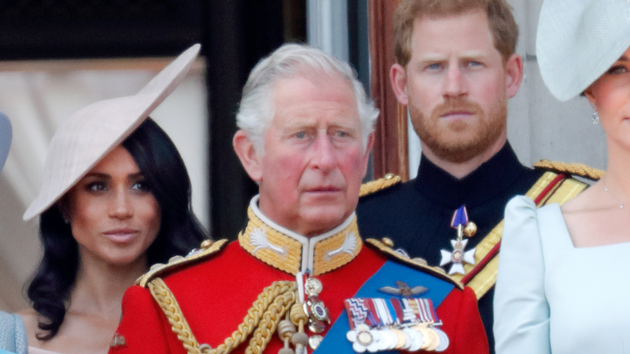 Meghan, Duchess of Sussex, Prince Charles, Prince of Wales and Prince Harry, Duke of Sussex stand on the balcony of Buckingham Palace during Trooping The Colour 2018 on June 9, 2018 in London, England.