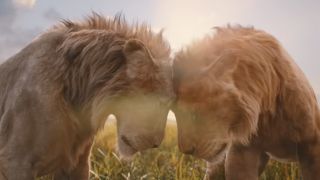 Mufasa and Taka (Scar) locking heads in Mufasa: The Lion King. 