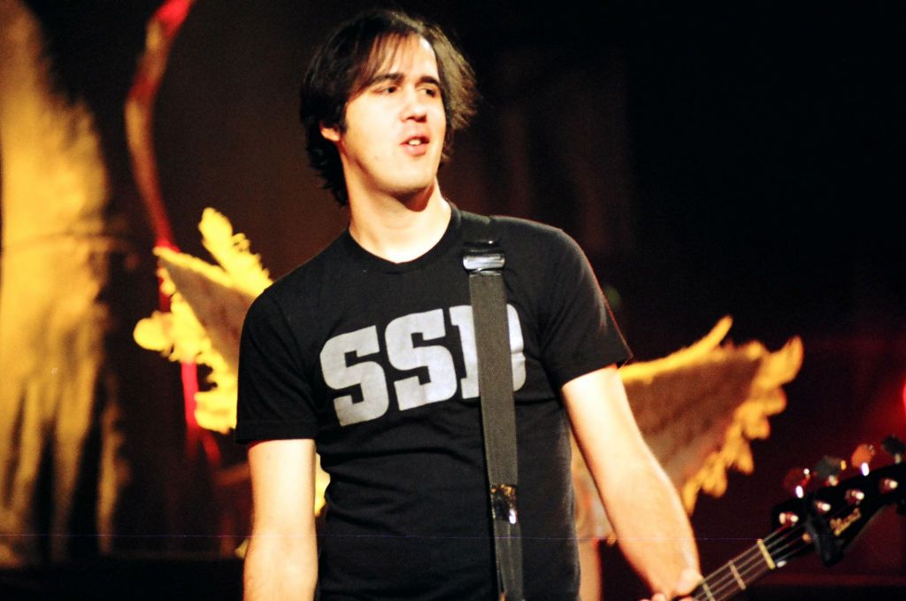 A picture of Krist Novoselic on stage with Nirvana