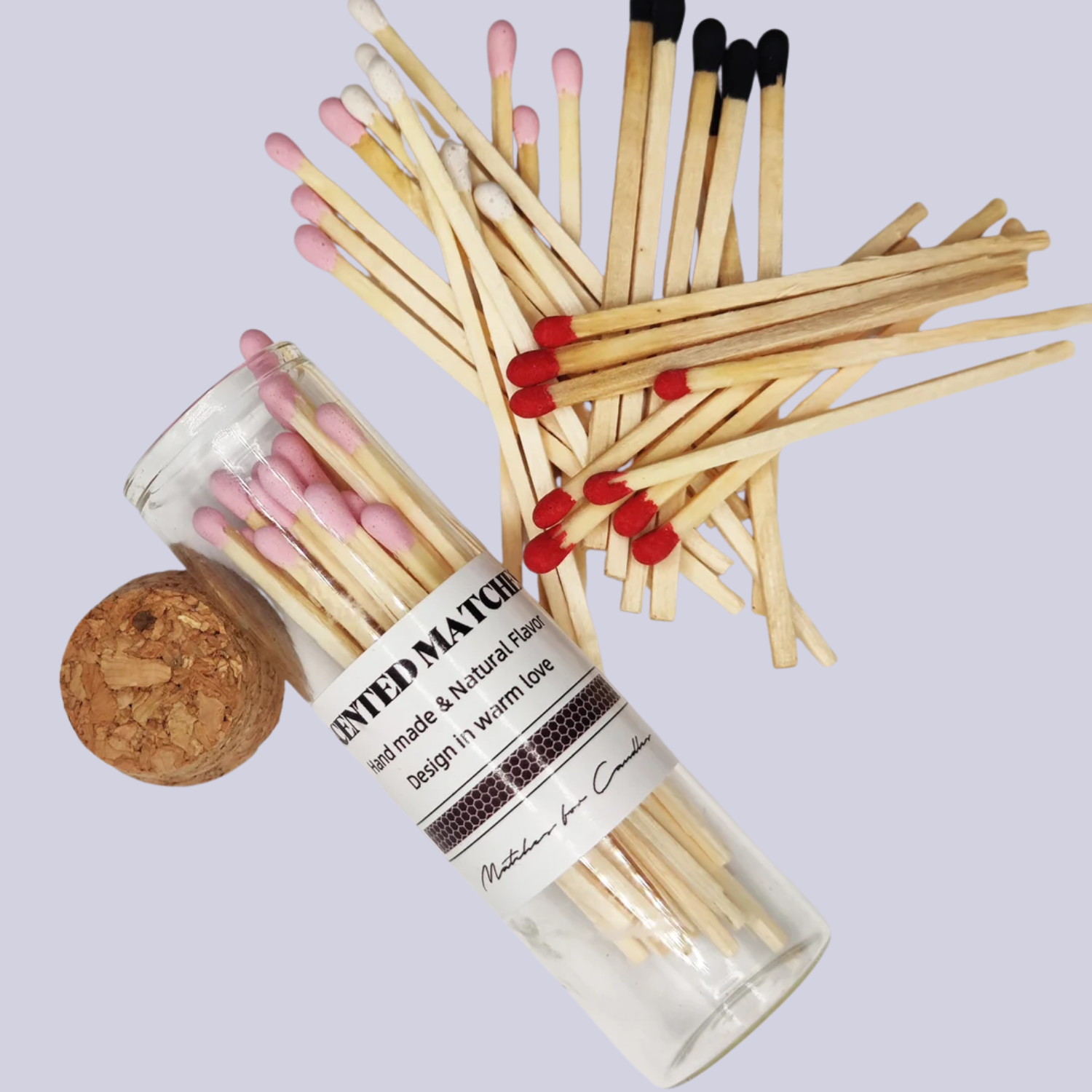 a tube of scented matches and a cork stopper