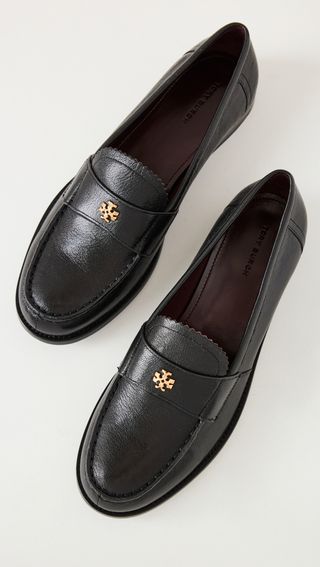 black leather loafers for women with tory burch's logo in gold