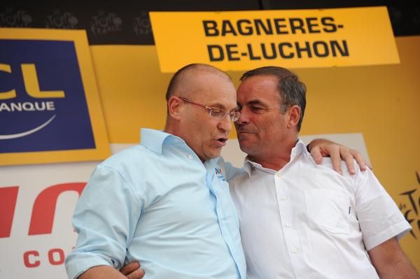 The last two French Tour winners on the podium, Laurent Fignon and Bernard Hinault
