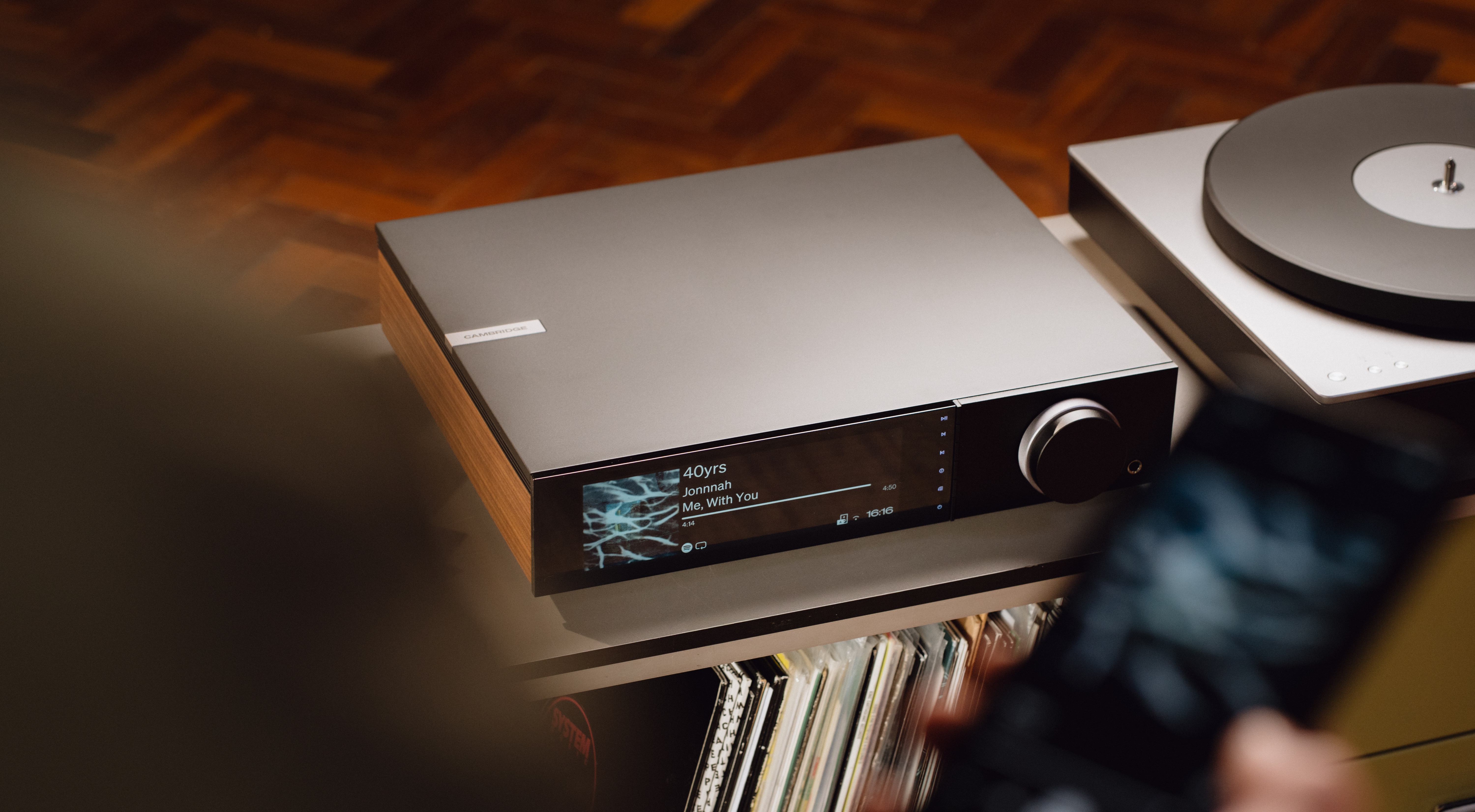 Cambridge Audio Evo 300 on a  side table next to a turntable