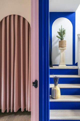 A staircase painted blue