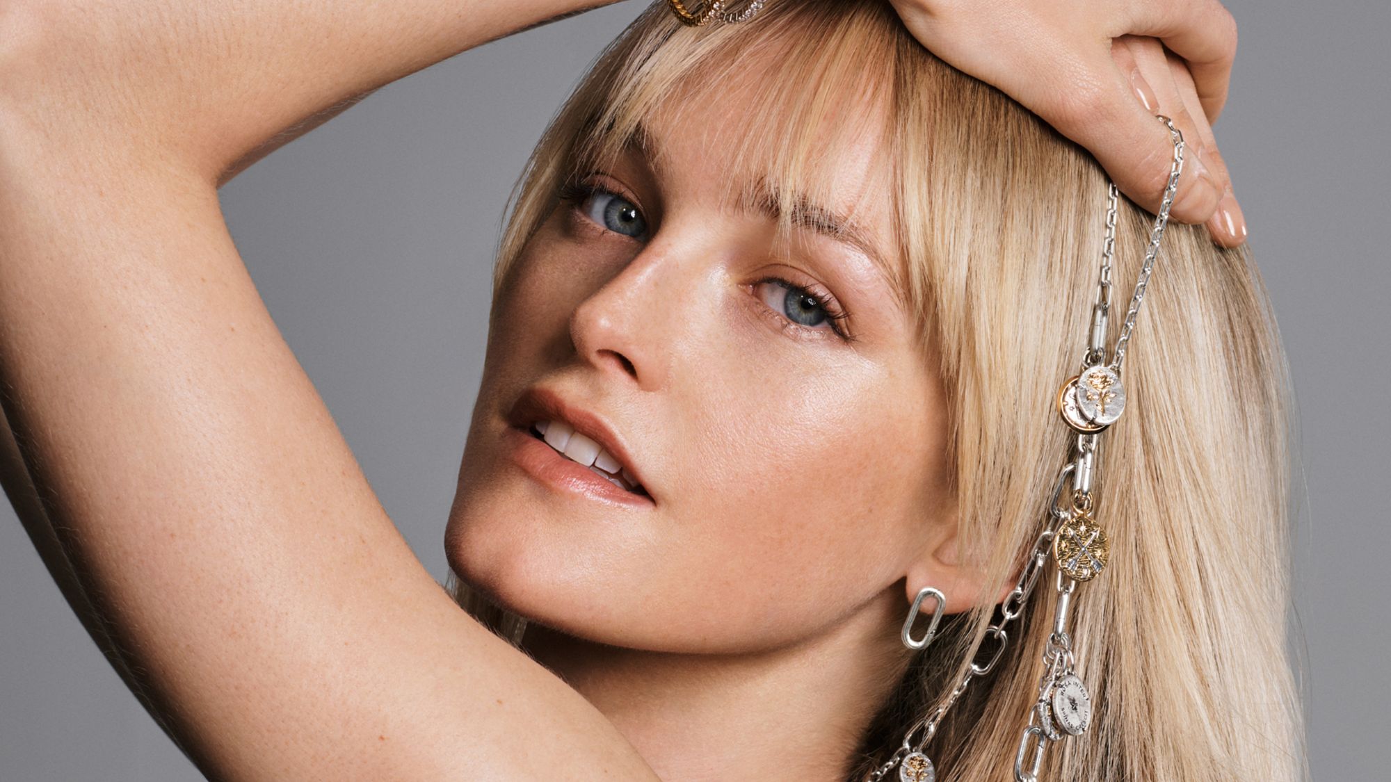 Jean Campbell models jewellery from pandora's talisman collection