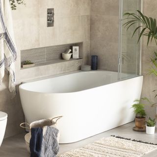 bathroom with corner bath and creamy colours