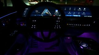 Cadillac Lyriq dashboard lit up at night.