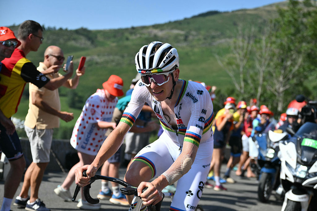 UAE Team Emirates - XRG team's Slovenian rider Tadej Pogacar cycles in a lone breakaway in the ascent of Hautacam during the 12th stage of the 112th edition of the Tour de France cycling race, 180.6 km between Auch and Hautacam, in the Pyrenees mountains of southwestern France, on July 17, 2025. (Photo by Marco BERTORELLO / AFP) (Photo by MARCO BERTORELLO/AFP via Getty Images)