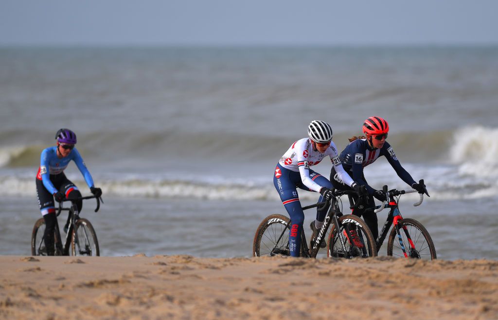OOSTENDE BELGIUM JANUARY 31 Josie Nelson of United Kingdom and Madigan Munro of The United States Sea Sand during the 72nd UCI CycloCross World Championships Oostende 2021 Women U23 UCICX CXWorldCup Ostend2021 CX on January 31 2021 in Oostende Belgium Photo by Luc ClaessenGetty Images