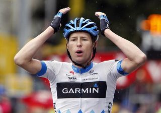 Ryder Hesjedal (Garmin-Cervelo) celebrates teammate Thor Hushovd's victory as he crosses the finish line two seconds later.