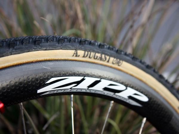 Zipp's latest 303 carbon tubulars have proven themselves tough enough for the arduous Spring Classics and are now also a favorite among 'cross racers not only for their strength but also the wider and more supportive tire bed.