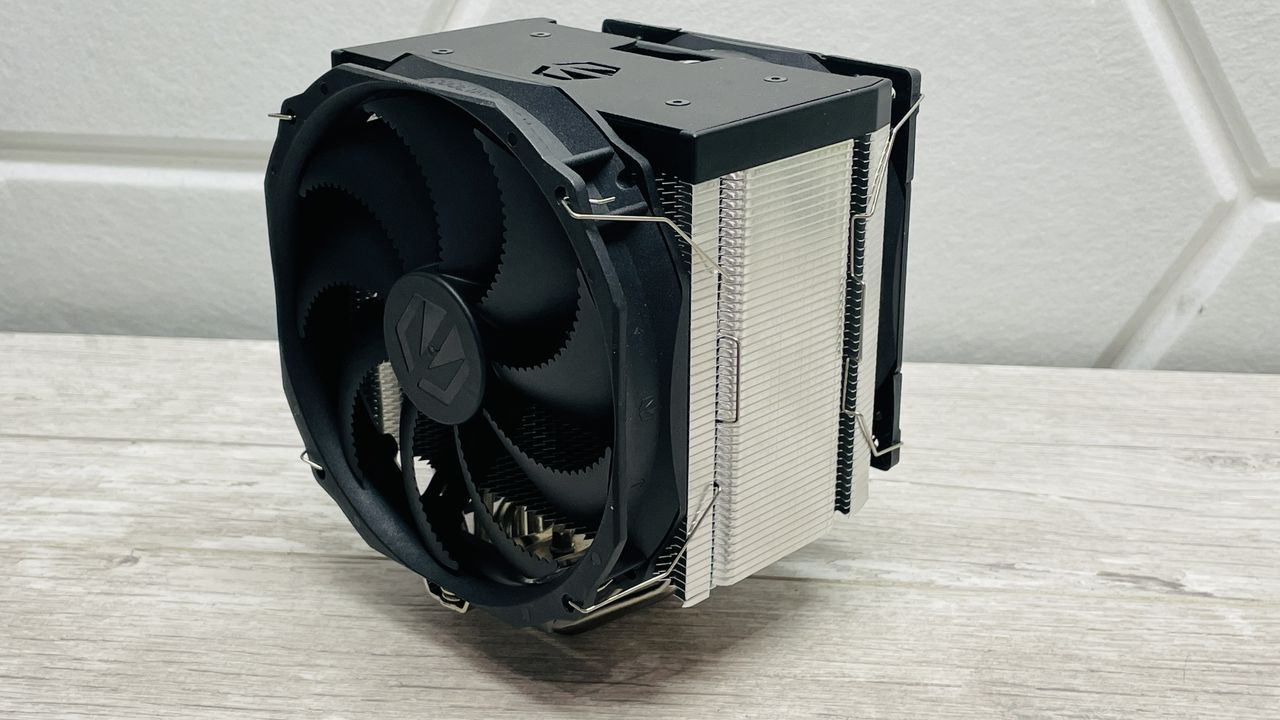 Endorfy Fortis 5 air cooler on a desk and loaded onto a motherboard.