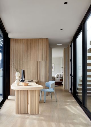 Home office with striped wooden panelling