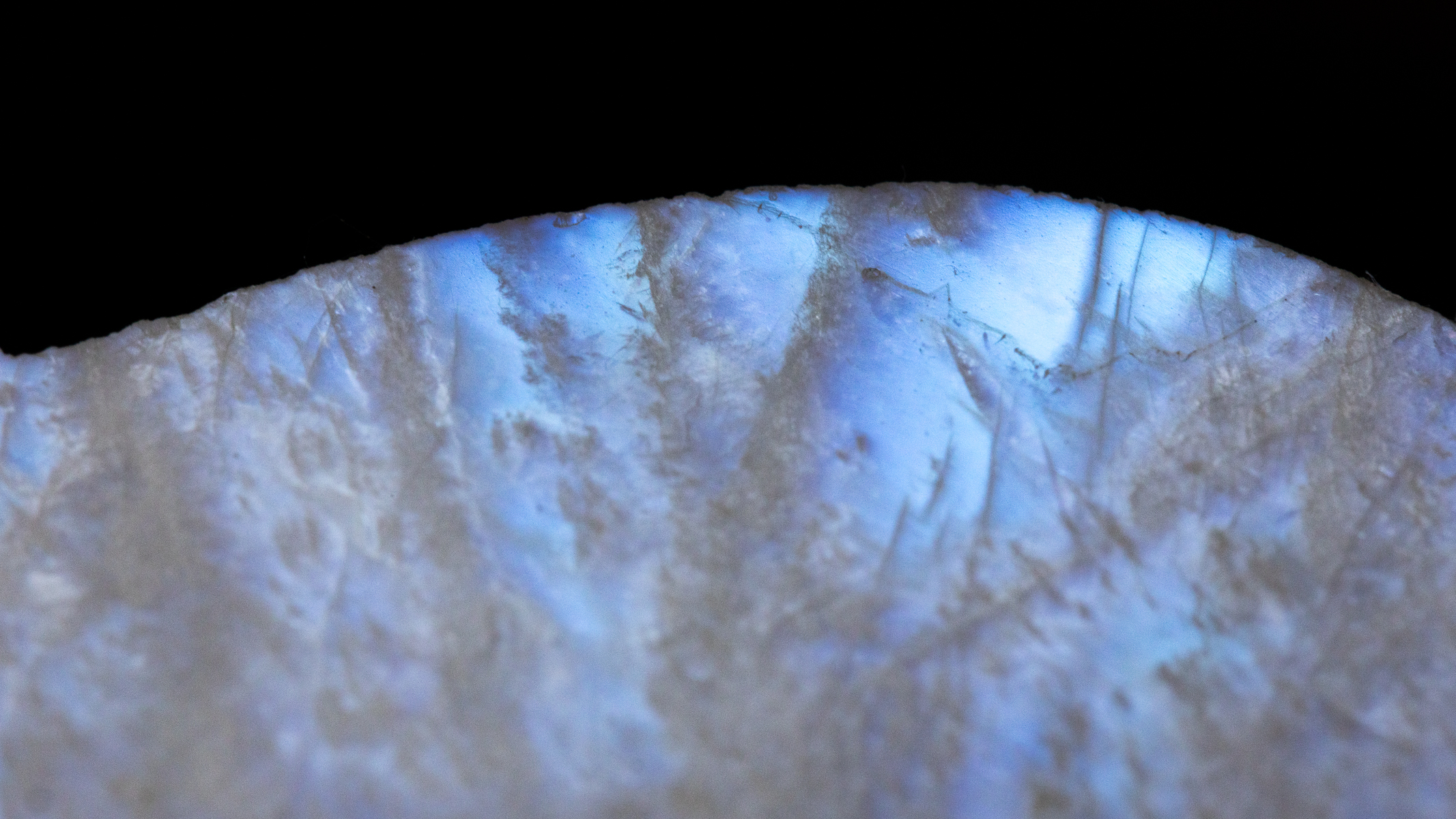 blue flash on a moonstone