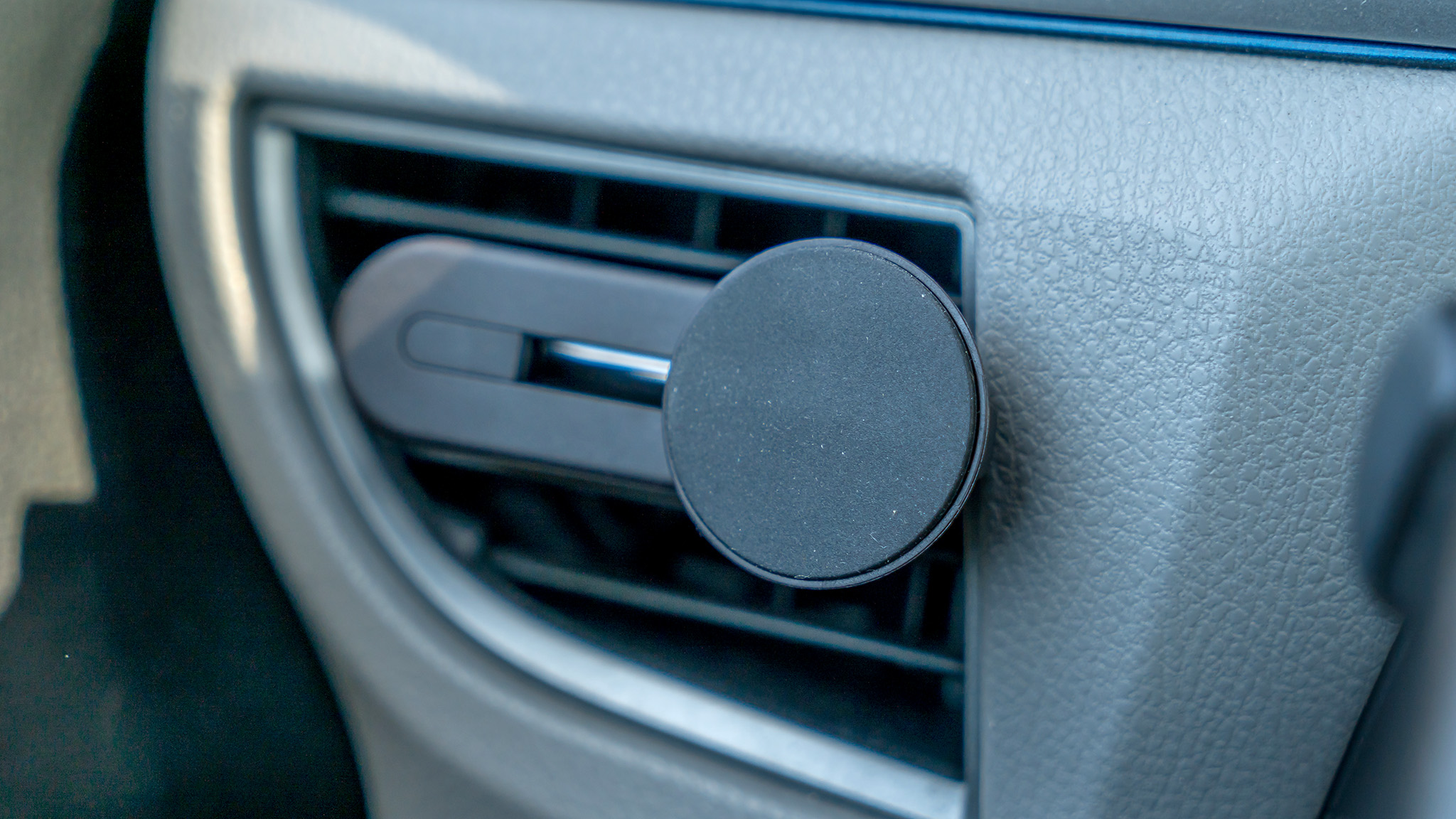 The magnetic car mount for Spotify Car Thing.