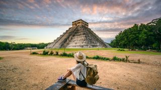 Tourist exploring Chichen-Itza archaeological site