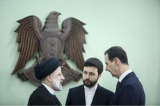 Syria’s Bashar al-Assad and Iranian counterpart Ebrahim Raisi 