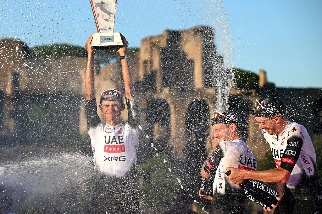 ROME, ITALY - JUNE 01: Second place winner - Isaac Del Toro of Mexico, Adam Yates of Great Britain and Brandon McNulty of The United States of Team UAE Team Emirates - XRG celebrate at podium as best team during the 108th Giro d&#039;Italia 2025, Stage 21 a 144.8km stage from Rome to Rome / #UCIWT / on June 01, 2025 in Rome, Italy. (Photo by Dario Belingheri/Getty Images)