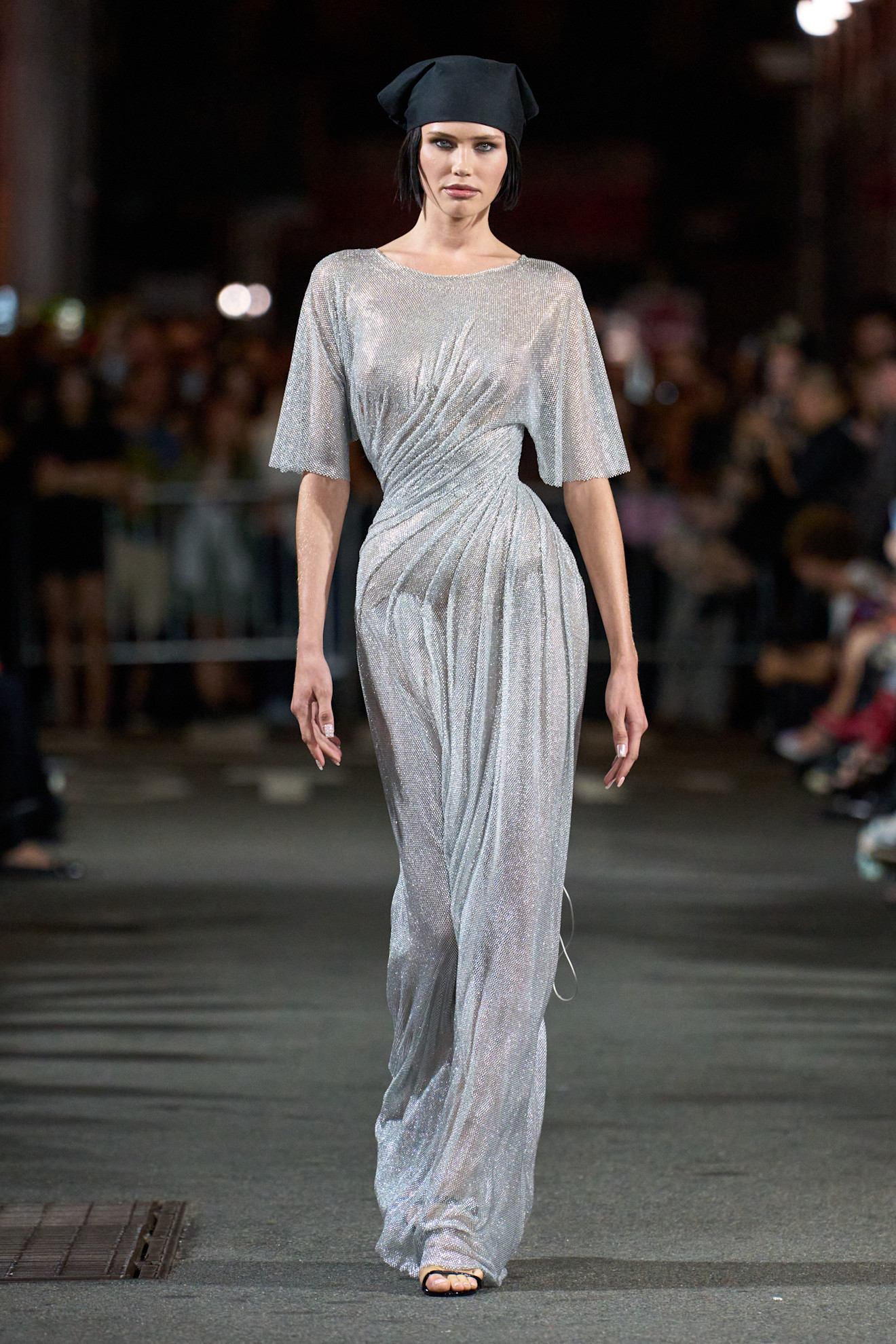 A model wore Sydney's Christian Cowan gown in the Spring 2026 show.