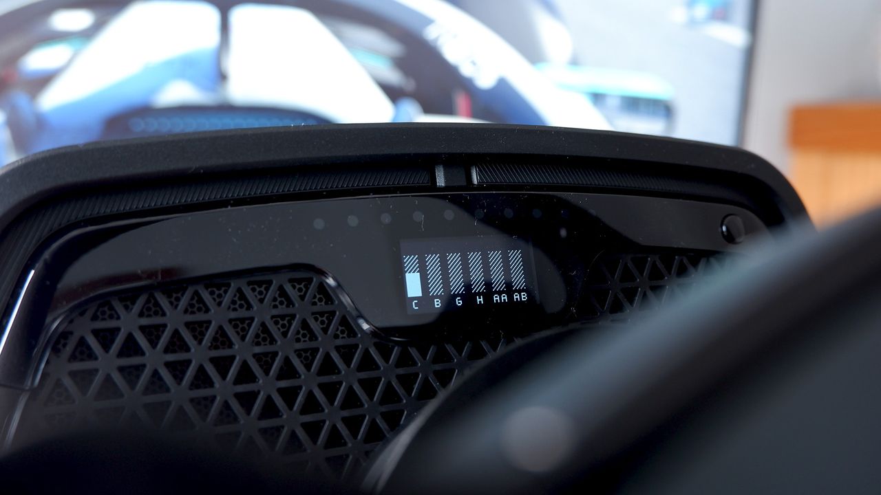 Logitech G Pro Racing Wheel and Pedals installed on a computer desk