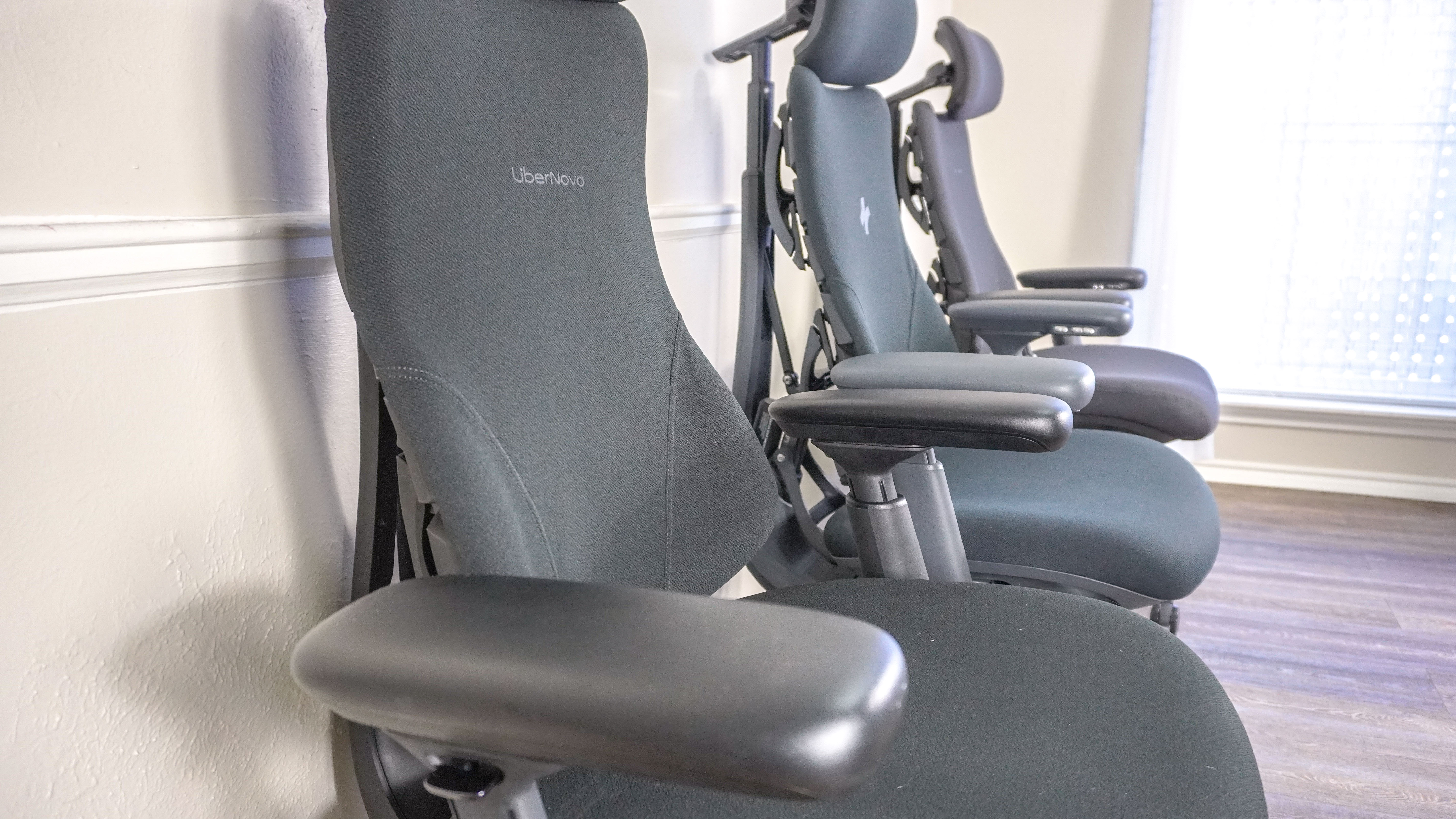 The LiberNovo Omni, Omni SE and Omni Pro seen from the side showing off their armrests