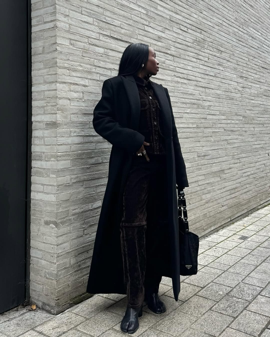 Danielle in brown corduroy trousers