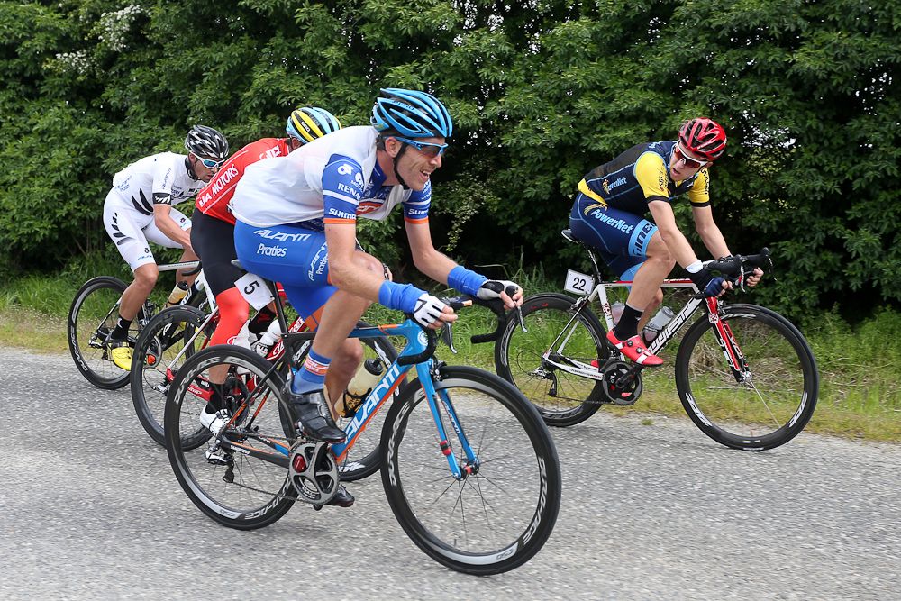 Taylor Gunman of Auckland (L) and Brad Evans of Dunedin out front of the chasing group heading to Gore during stage five of the Tour of Southland