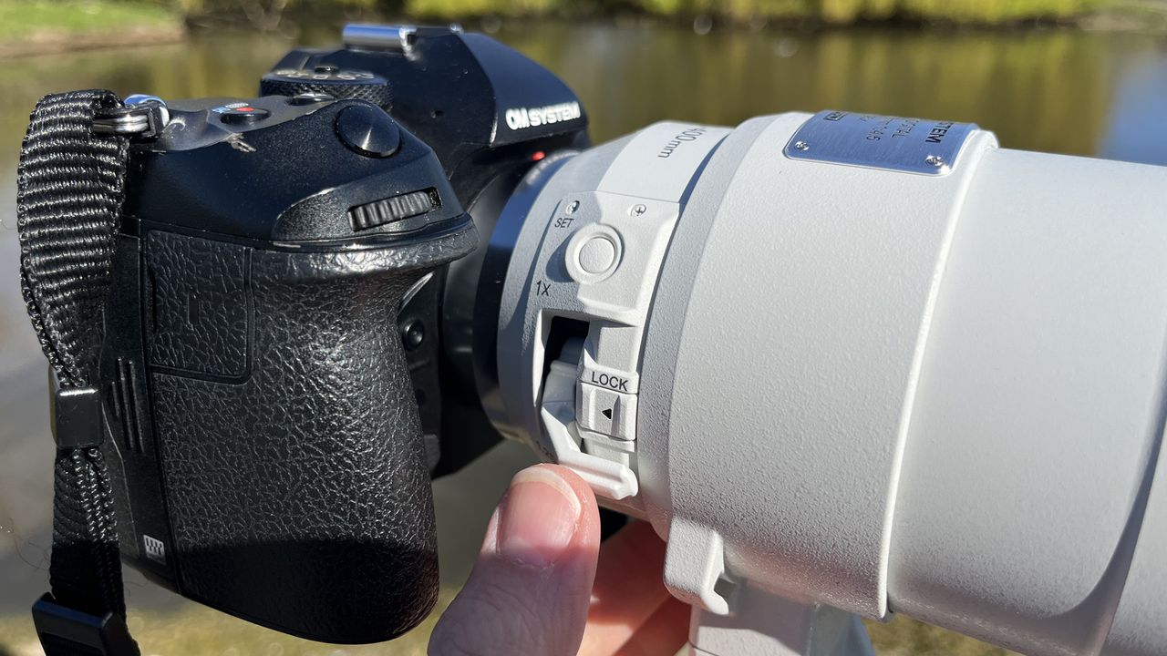 Mike Harris holding OM System M.Zuiko 150-400mm f/4.5 TC1.25x IS PRO at Slimbridge Wetland Centre