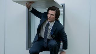 Adam Scott's Mark exiting from a small square door in Severance Season 2 episode 3 "Who Is Alive?"