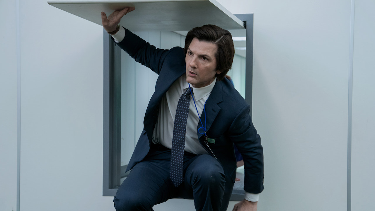 Adam Scott's Mark exiting from a small square door in Severance Season 2 episode 3 "Who Is Alive?"