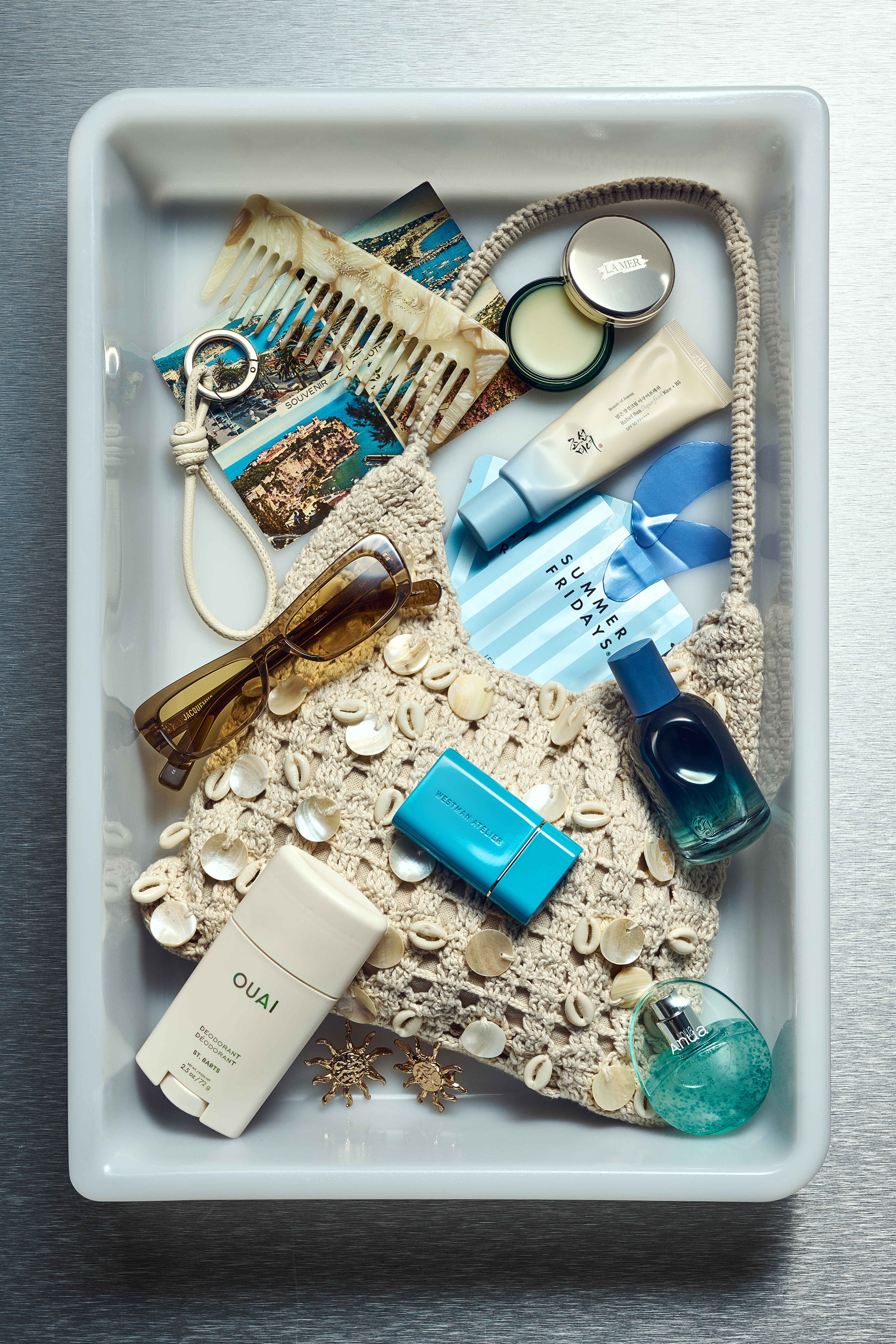 Grace's airport tray, featuring blue and cream tones and coastal aesthetic