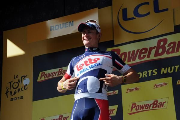 Stage 4 winner Andre Greipel thanks his team's sponsors on the podium.