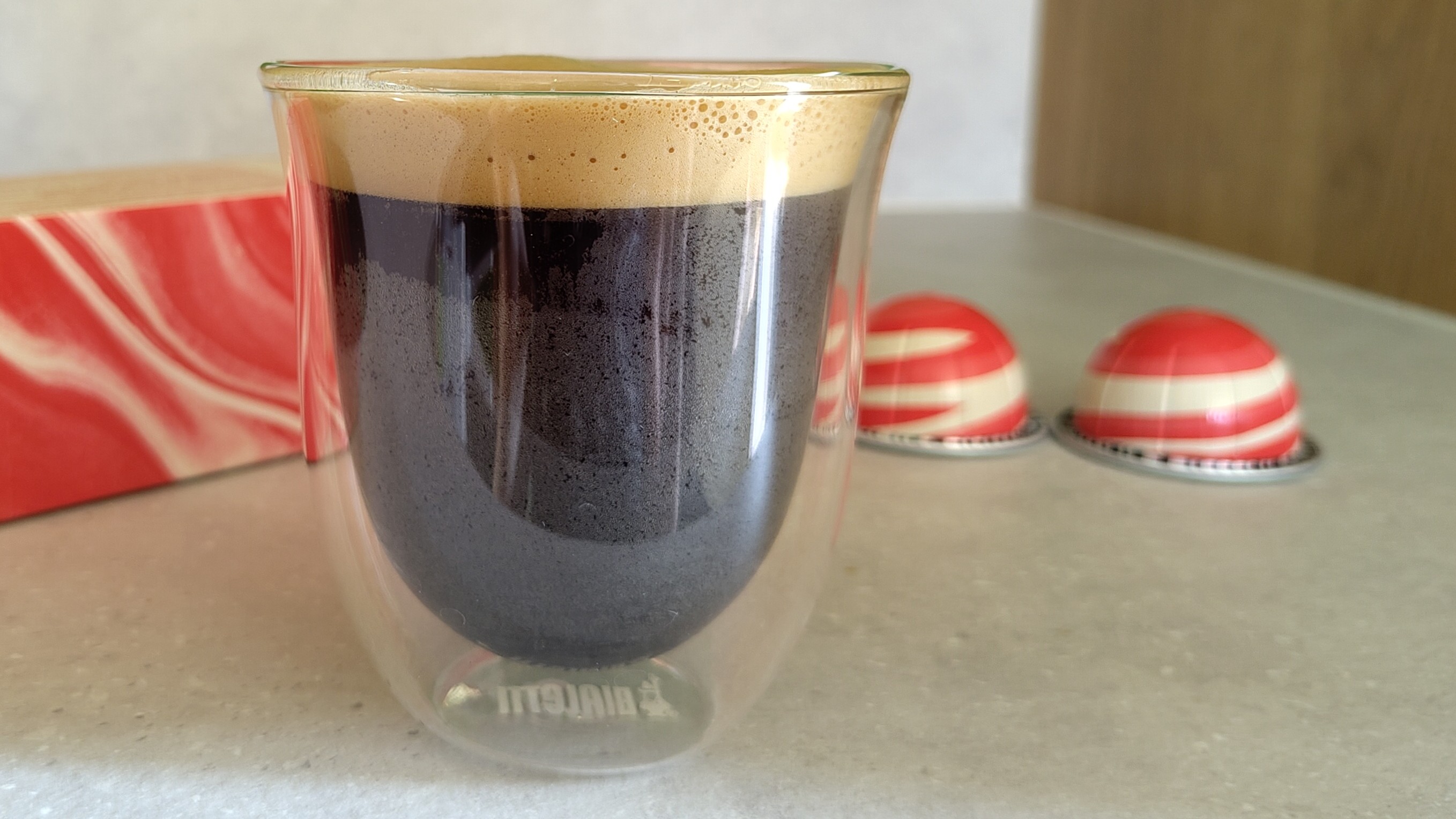 Nespresso white chocolate and strawberry coffee in glass cup