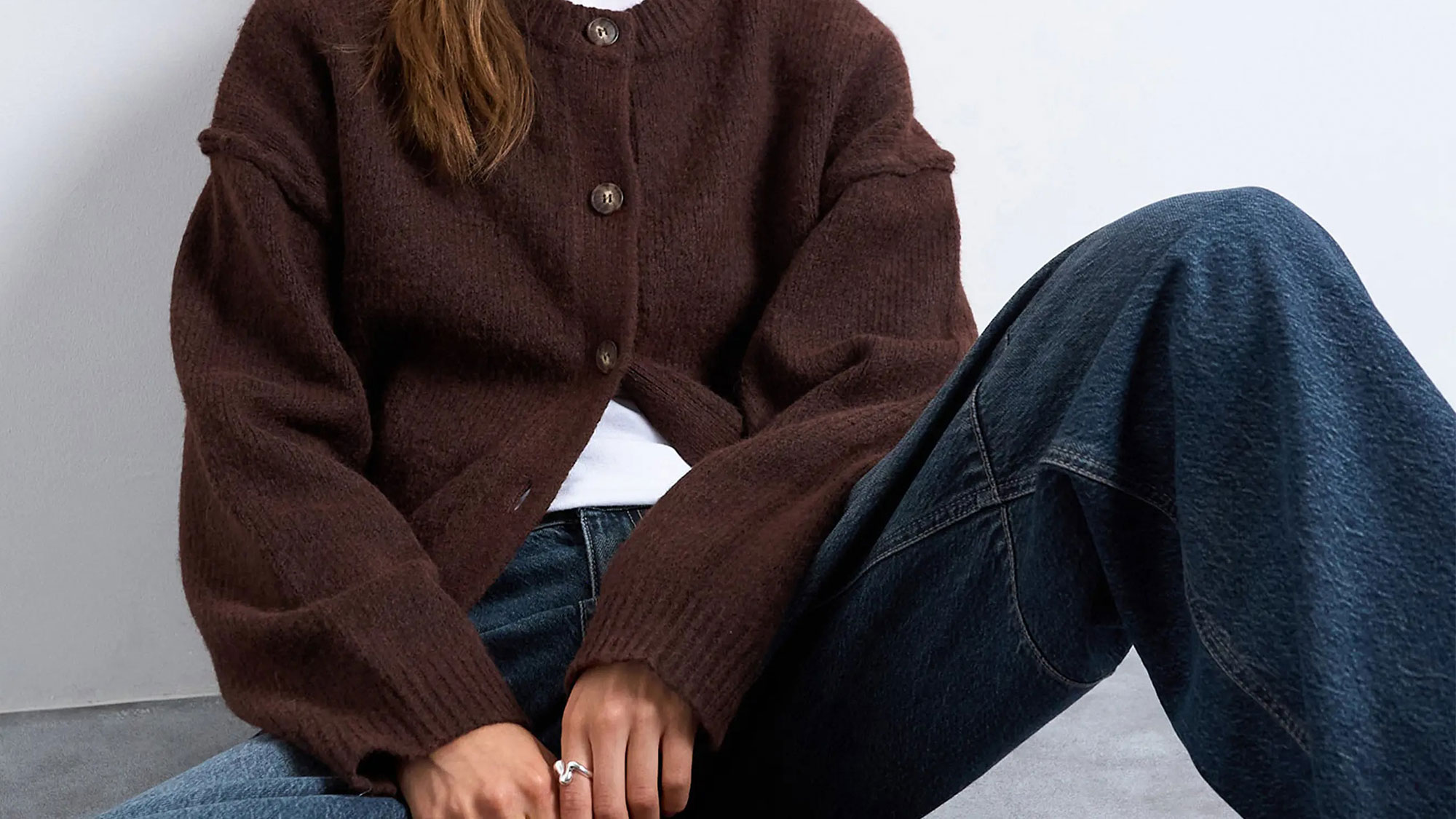 Model wearing a Nordstrom sweater under $100.