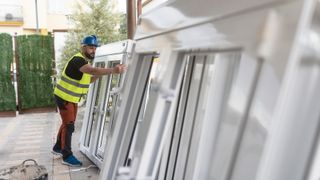 An installing looking at window frames