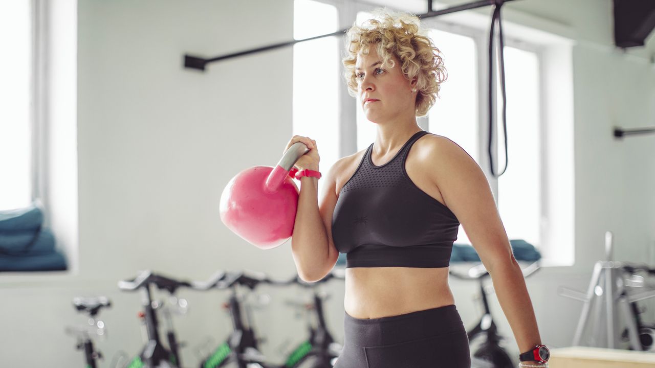 Woman doing a kettlebell workout