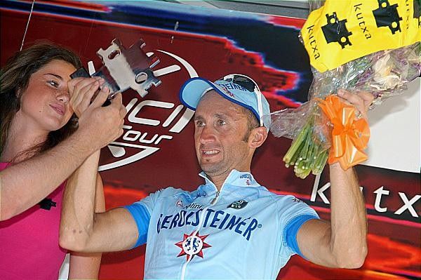 Rebellin accepts a rather unusual trophy.