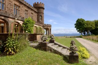 Looking out to Loch Scresort from Kinloch Castle, built in 1897 to designs supplied by Leeming and Leeming of Halifax. Not Used CL 12/08/2009 Photograph: Simon Jauncey/Countr