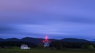 The Green Bank Telescope is seen in the evening at The Green Bank Observatory in Green Bank, West Virginia on May 28, 2018. - Green Bank is part of the US Radio Quiet Zone, where wireless telecommunications signals are banned to prevent transmissions interfering with a number of radio telescopes in the area. The largest steerable telescope in the world, the Green Bank Telescope, enables scientists to listen to low-level signals from different places in the universe.