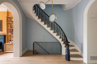 a hallway in a brownstone house