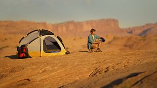 Man Camping in Desert near Moab, Utah