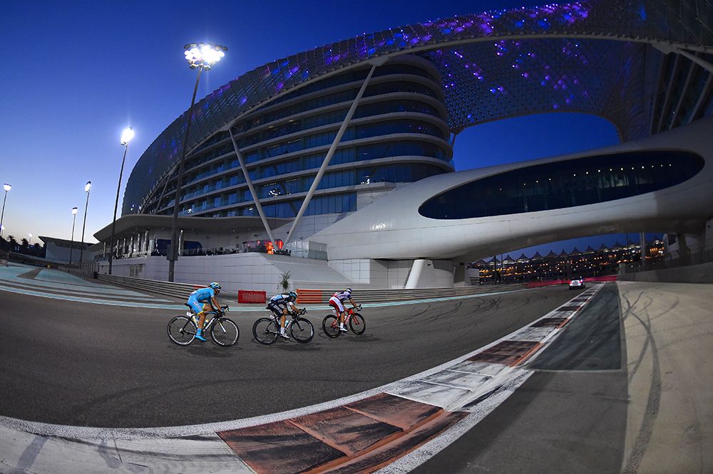 Racing on the Yas Marina Formula One circuit at the Abu Dhabi Tour