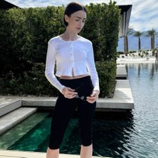 Lily Collins wears capri pants