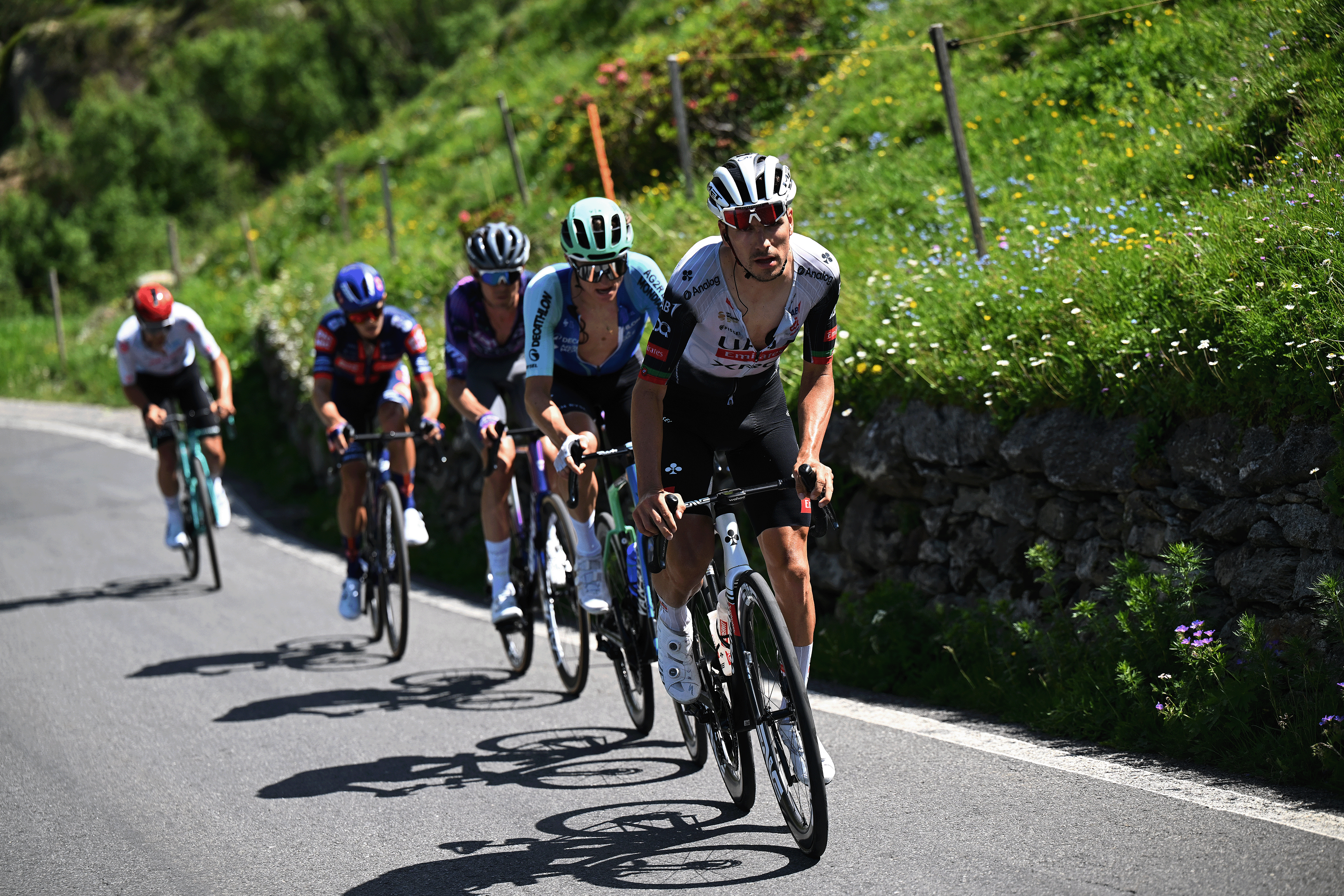 PIURO, SWITZERLAND - JUNE 18: Joao Almeida of Portugal and UAE Team Emirates - XRG competes in the breakaway during the 88th Tour de Suisse, Stage 4 a 193.2km stage from Heiden to Piuro (Valchiavenna) / #UCIWT / on June 18, 2025 in Piuro, Switzerland. (Photo by Tim de Waele/Getty Images)