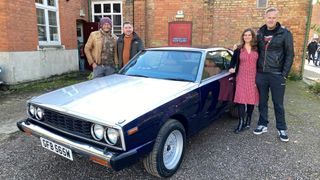 Car S.O.S hosts Fuzz Townshend and Tim Shaw stood with Adam and partner around his newly-renovated Datsun 240k Syline in Car S.O.S season 12.