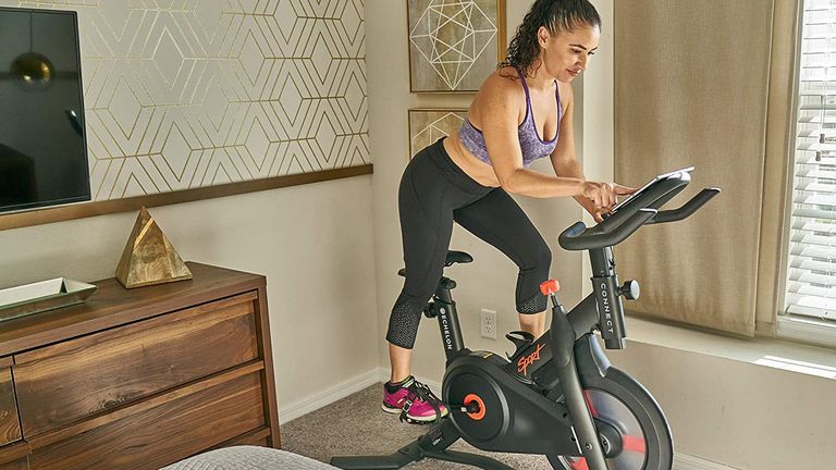 Echelon Connect Sport bike – woman using the bike at home