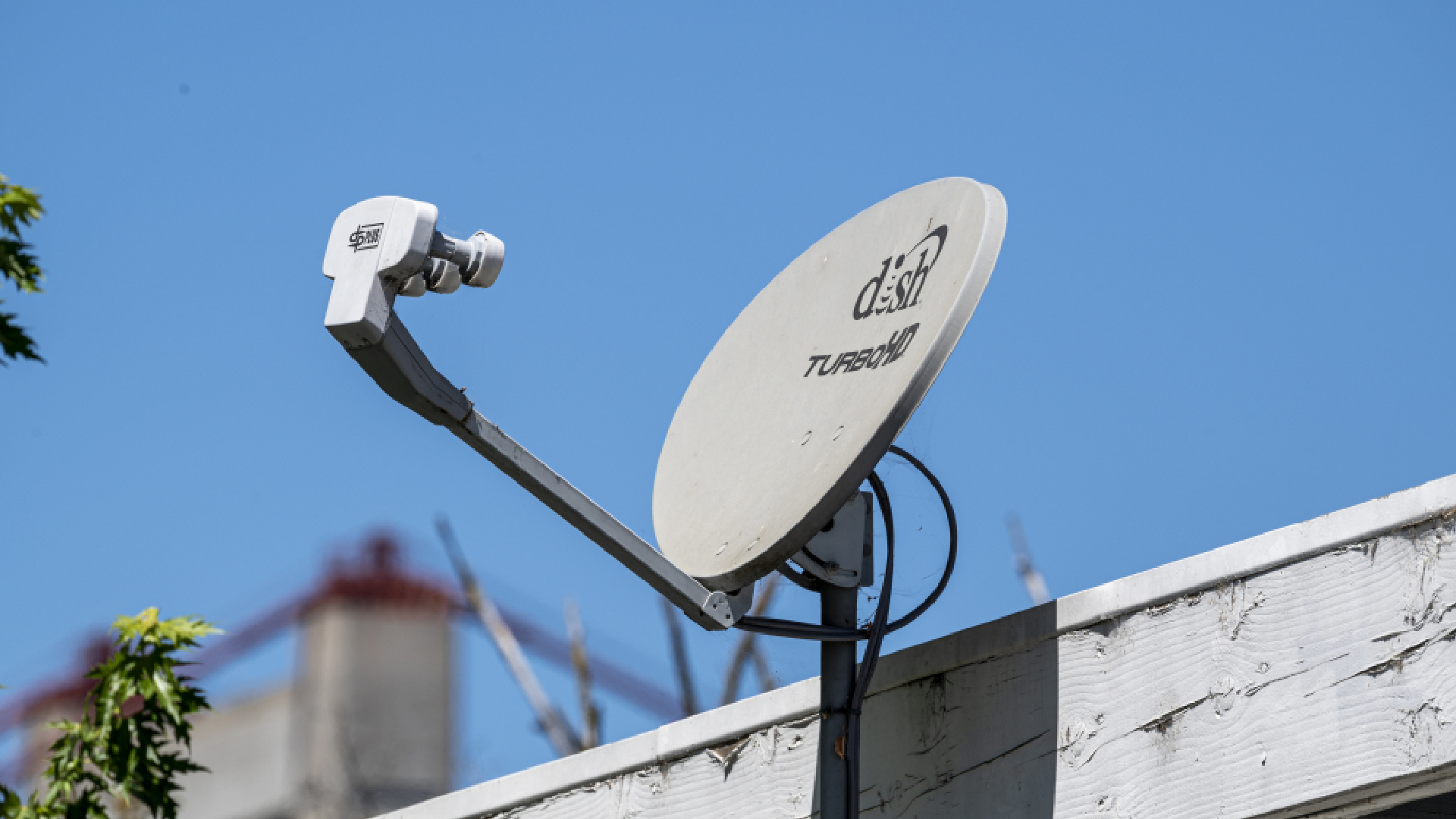 A Dish Network satellite dish on the roof of a home in Crockett, California, US, on Monday, July 31, 2023. Dish Network Corp. is scheduled to release earnings figures on August 3. Photographer: David Paul Morris/Bloomberg via Getty Images