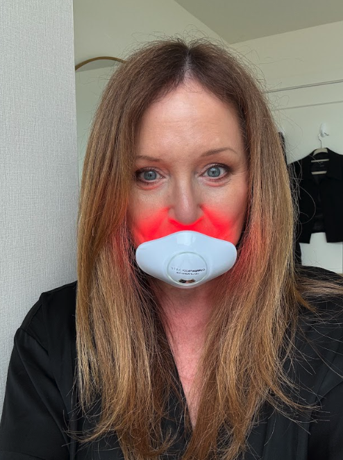 Mindy H., a 'Marie Claire' tester, tests the CurrentBody Skin LED Lip Perfector